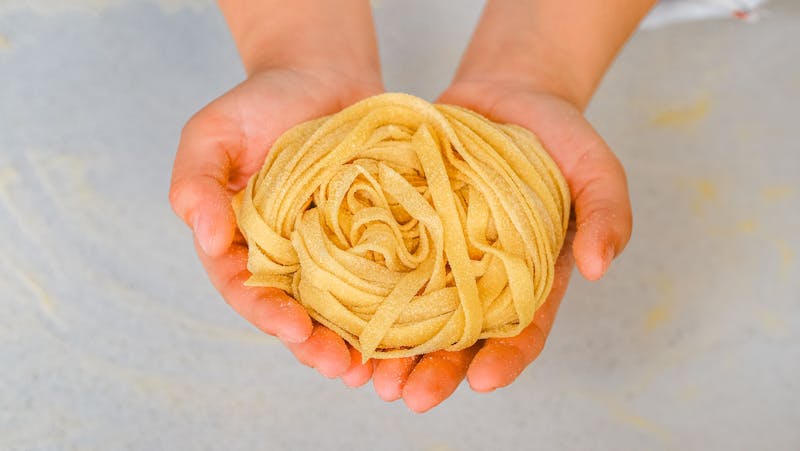 Cacio e Pepe — freshly made pasta with pecorino and black pepper at Pizzana