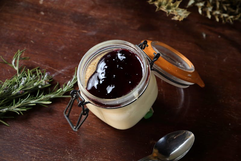 Panna Cotta — vanilla cream dessert with berry compote at Pizzana